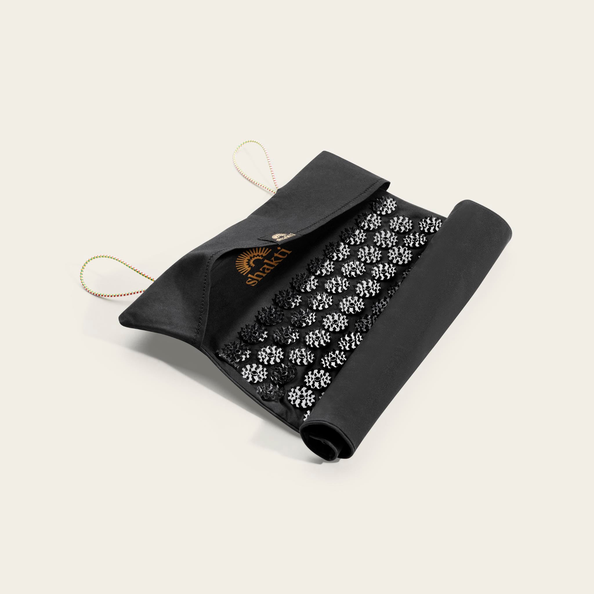 01_Shakti-To-Go-Acupressure-Mat-Black-Rolled.jpg